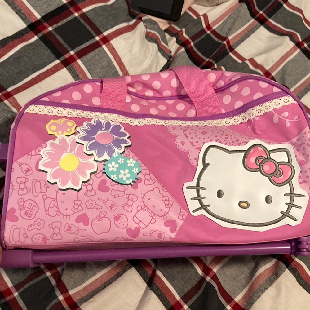 Hello kitty rolling suitcase